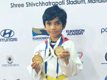 Sibiraj son Dheeran wins two gold medals at National Taekwondo Championship in Pune